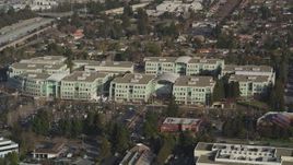 5K aerial stock footage of flying by Apple Headquarters office buildings, Cupertino, California Aerial Stock Footage | JDC04_015