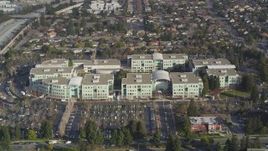 5K aerial stock footage of flying away from Apple Headquarters office buildings, Cupertino, California Aerial Stock Footage | JDC04_019