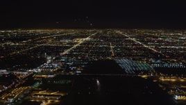 5K aerial stock footage tilt from runway to reveal approaching jet at night, LAX (Los Angeles International Airport), California Aerial Stock Footage | LD01_0008