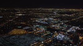 5K aerial stock footage track a passenger jet landing at night, LAX (Los Angeles International Airport), California Aerial Stock Footage | LD01_0016