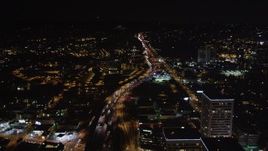 5K aerial stock footage of the 405 freeway at night in West Los Angeles, California Aerial Stock Footage | LD01_0048