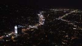 5K aerial stock footage of approaching Sunset Strip at night in West Hollywood, California Aerial Stock Footage | LD01_0061