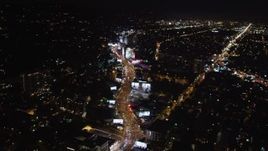 5K aerial stock footage following the Sunset Strip at night in West Hollywood, California Aerial Stock Footage | LD01_0062
