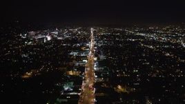 5K aerial stock footage tilt from bird's eye of Sunset Strip in West Hollywood, California at night Aerial Stock Footage | LD01_0068