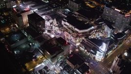 5K aerial stock footage of mall, theaters and hotels at night in Hollywood, California Aerial Stock Footage | LD01_0072