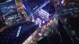 5K aerial stock footage orbit ice skating at Nokia Theater, and tilt to hotels at night Downtown Los Angeles, California Aerial Stock Footage | LD01_0082