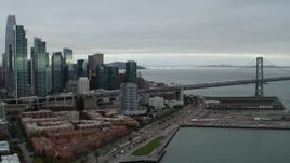 5.7K stock footage aerial video slowly approaching Bay Bridge and city's skyline from the South of Market, Downtown San Francisco, California Aerial Stock Footage | PP0002_000006