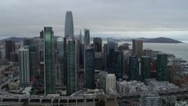 5.7K stock footage aerial video ascend by skyscrapers in city's skyline, Downtown San Francisco, California Aerial Stock Footage | PP0002_000009