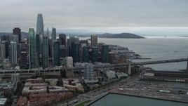5.7K stock footage aerial video pan from skyscrapers in city's skyline to Bay Bridge, Downtown San Francisco, California Aerial Stock Footage | PP0002_000011