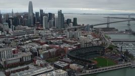 5.7K stock footage aerial video flying by AT&T Park, with city skyline in background, Downtown San Francisco, California Aerial Stock Footage | PP0002_000015