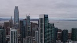 5.7K stock footage aerial video of Salesforce Tower behind South of Market skyscraper, Downtown San Francisco, California Aerial Stock Footage | PP0002_000024