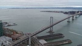 5.7K stock footage aerial video pan from the Bay Bridge, reveal South of Market skyscrapers, Downtown San Francisco, California Aerial Stock Footage | PP0002_000033
