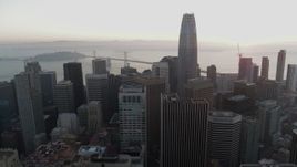 5.7K stock footage aerial video of Salesforce Tower at sunrise near Bay Bridge during descent in Downtown San Francisco, California Aerial Stock Footage | PP0002_000062