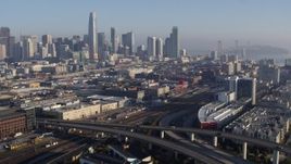 5.7K stock footage aerial video approach the city's skyline from South of Market train station, Downtown San Francisco, California Aerial Stock Footage | PP0002_000097