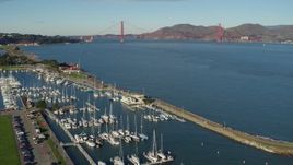 5.7K stock footage aerial video of the Golden Gate Bridge seen from San Francisco Marina in California Aerial Stock Footage | PP0002_000134