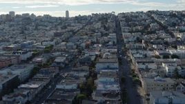 5.7K stock footage aerial video reverse view of quiet city street lined with apartment buildings in the Marina District, San Francisco, California Aerial Stock Footage | PP0002_000153
