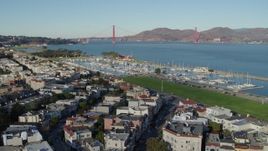 5.7K stock footage aerial video reverse view of Golden Gate Bridge and marina in the Marina District, San Francisco, California Aerial Stock Footage | PP0002_000156