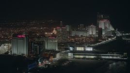 HD stock footage aerial video of several beachside hotels and casinos at night in Atlantic City, New Jersey Aerial Stock Footage | PP003_020