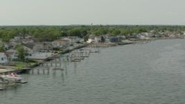 HD stock footage aerial video of waterfront homes on the shore of a bay in Merrick, New York Aerial Stock Footage | PP003_045