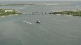 HD stock footage aerial video of approaching a ferry and a bridge in Point Lookout, New York Aerial Stock Footage | PP003_047