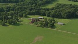 HD stock footage aerial video flyby barns and green fields at a farm in Jackson, New Jersey Aerial Stock Footage | PP003_079