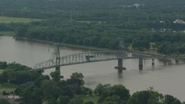 HD stock footage aerial video of flying by the Burlington-Bristol Bridge spanning a river in Burlington, New Jersey Aerial Stock Footage | PP003_081