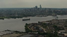 HD stock footage aerial video skyscrapers of the city skyline seen from across the river, Downtown Philadelphia, Pennsylvania Aerial Stock Footage | PP003_087