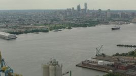HD stock footage aerial video of the city's skyscrapers and skyline seen from the river, Downtown Philadelphia, Pennsylvania Aerial Stock Footage | PP003_088