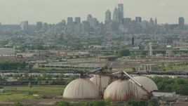 HD stock footage aerial video of the Downtown Philadelphia skyline seen from silos, Pennsylvania Aerial Stock Footage | PP003_093