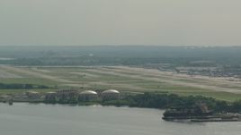 HD stock footage aerial video of the Philadelphia International Airport in Pennsylvania, seen from the river Aerial Stock Footage | PP003_095