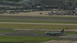HD stock footage aerial video of a commercial airplane on the runway at Philadelphia International Airport, Pennsylvania Aerial Stock Footage | PP003_099