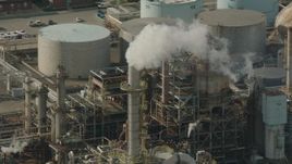 HD stock footage aerial video of steam venting from an oil refinery structure in Chester, Pennsylvania Aerial Stock Footage | PP003_104