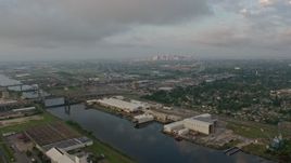 4K aerial stock footage of Industrial Canal in Upper Ninth Ward at sunrise, New Orleans, Louisiana Aerial Stock Footage | PVED01_002