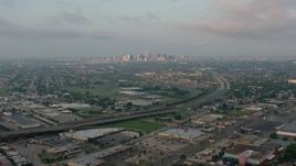 4K aerial stock footage of Downtown New Orleans skyline from Gentilly at sunrise, Louisiana Aerial Stock Footage | PVED01_003