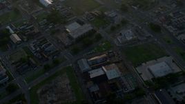 4K aerial stock footage fly over Downtown New Orleans toward the Mississippi River at sunrise, Louisiana Aerial Stock Footage | PVED01_009E