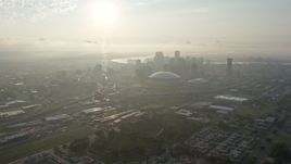 4K aerial stock footage approach Superdome and Downtown New Orleans from Mid-City at sunrise, Louisiana Aerial Stock Footage | PVED01_026