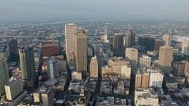 4K aerial stock footage orbit tall skyscrapers in Downtown New Orleans, Louisiana at sunrise Aerial Stock Footage | PVED01_040