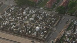 4K aerial stock footage of two cemeteries in the French Quarter of New Orleans at sunrise, Louisiana Aerial Stock Footage | PVED01_054