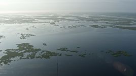 4K aerial stock footage fly over marshland and bayou at sunrise in St. Bernard Parish, Louisiana Aerial Stock Footage | PVED01_068E