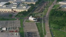 4K aerial stock footage orbit a booster rocket at a NASA Factory at sunrise in New Orleans East, Louisiana Aerial Stock Footage | PVED01_082