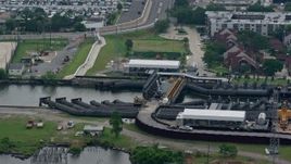 4K aerial stock footage orbit pumping station on 17th Street Canal in Metairie, New Orleans, Louisiana Aerial Stock Footage | PVED01_096