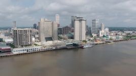 4K aerial stock footage riverfront skyscrapers in Downtown New Orleans, Louisiana Aerial Stock Footage | PVED01_134