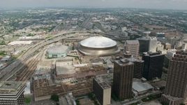 4K aerial stock footage orbiting the Louisiana Superdome and the New Orleans Arena in Downtown New Orleans, Louisiana Aerial Stock Footage | PVED01_139