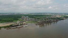 4K aerial stock footage orbit a riverfront factory in New Orleans, Louisiana Aerial Stock Footage | PVED01_152