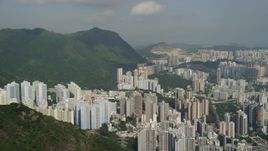 5K stock footage aerial video pan across groups of apartment high-rises in Kowloon, Hong Kong, China Aerial Stock Footage | SS01_0003