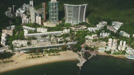 5K stock footage aerial video of pan across beachfront condos on Hong Kong Island, China Aerial Stock Footage | SS01_0056
