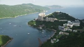 5K stock footage aerial video approach apartment complexes overlooking harbor on Hong Kong Island, China Aerial Stock Footage | SS01_0060
