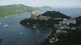 5K stock footage aerial video approach apartment complexes by Tai Tam Harbor on Hong Kong Island, China Aerial Stock Footage | SS01_0066
