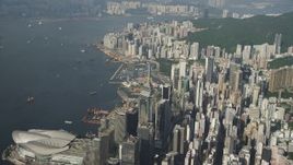 5K stock footage aerial video of skyscrapers on the shore of Victoria Harbor on Hong Kong Island, China Aerial Stock Footage | SS01_0085