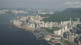 5K stock footage video of skyscrapers overlooking Victoria Harbor on Hong Kong Island, China Aerial Stock Footage | SS01_0087